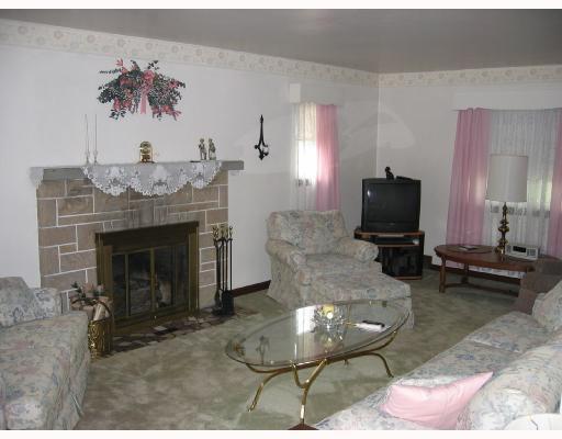 1328 Oakridge Road McDonald, PA 15057 - Photo 2 of 8 Living Room. Gas-burning fireplace.
