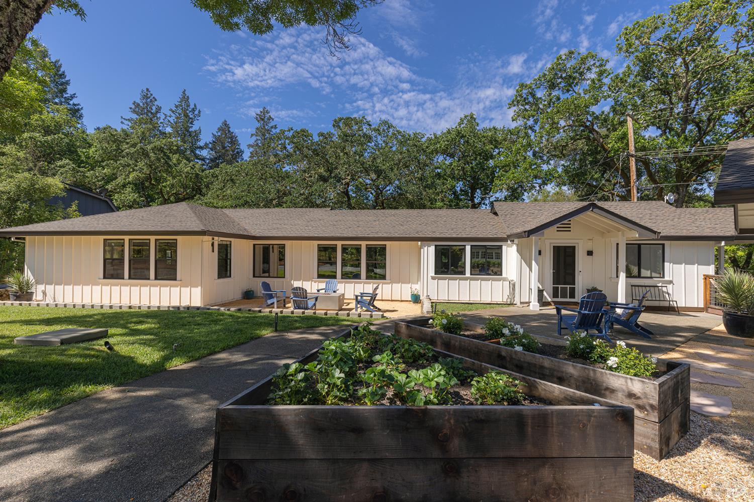 front view of a house with a yard