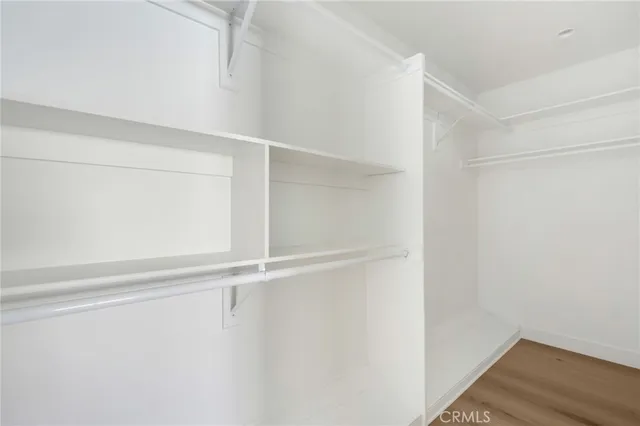 a view of an empty walk in closet