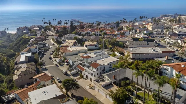 an aerial view of a city with lots of residential buildings