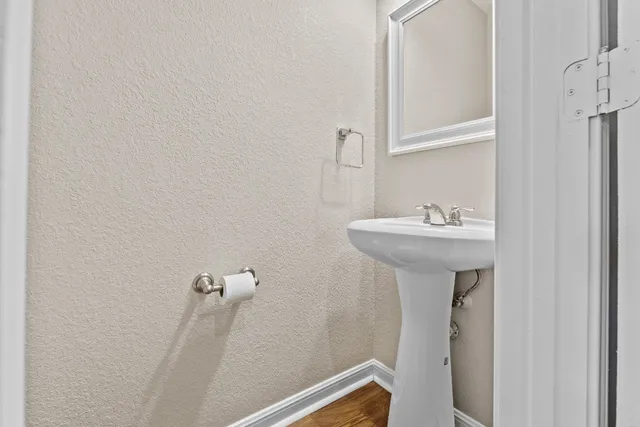a view of a livingroom with wooden floor