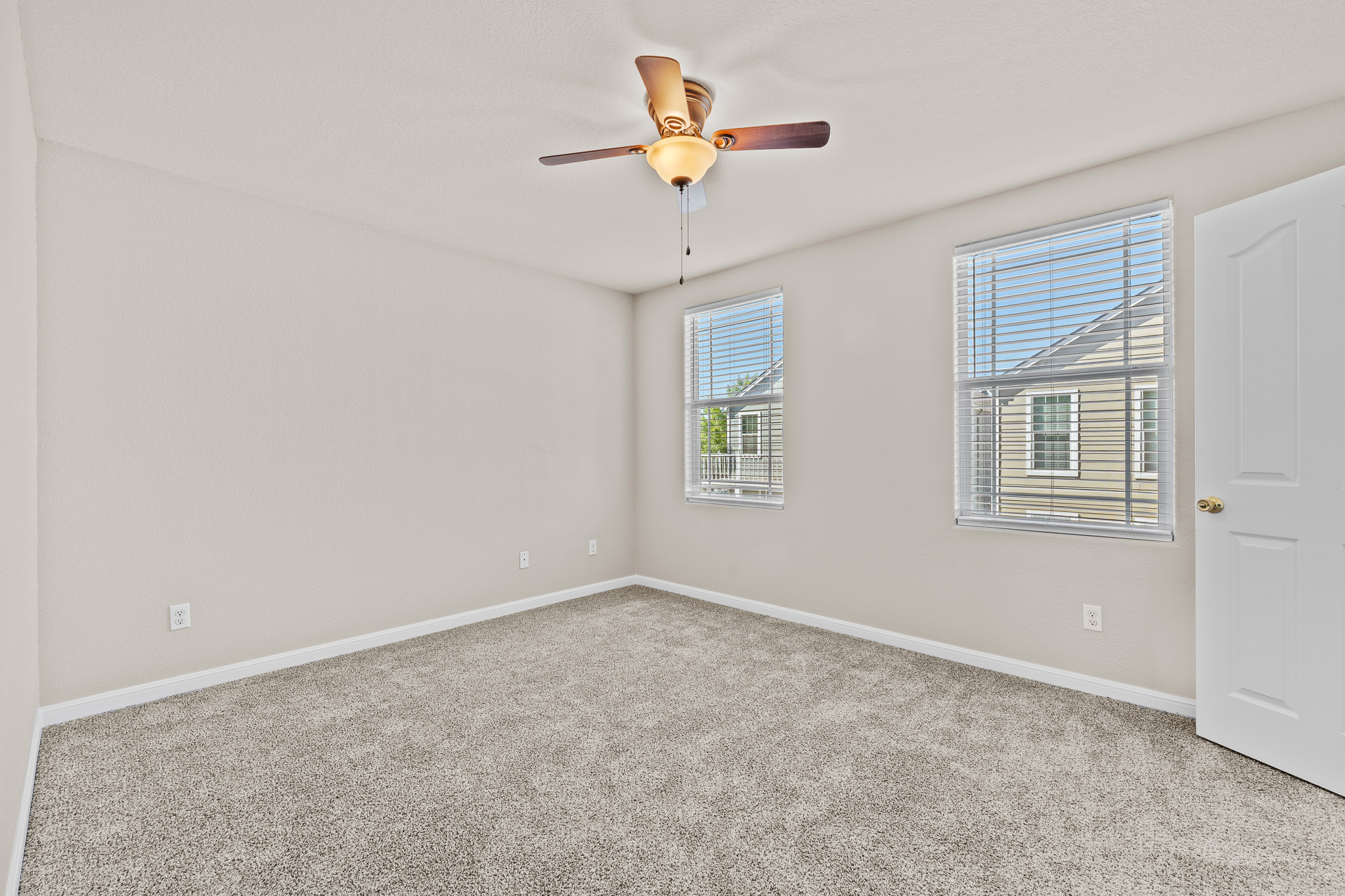 220 Trestle Tree San Marcos, TX 78666 - Photo 13 of 28 Empty room featuring carpet and a ceiling fan