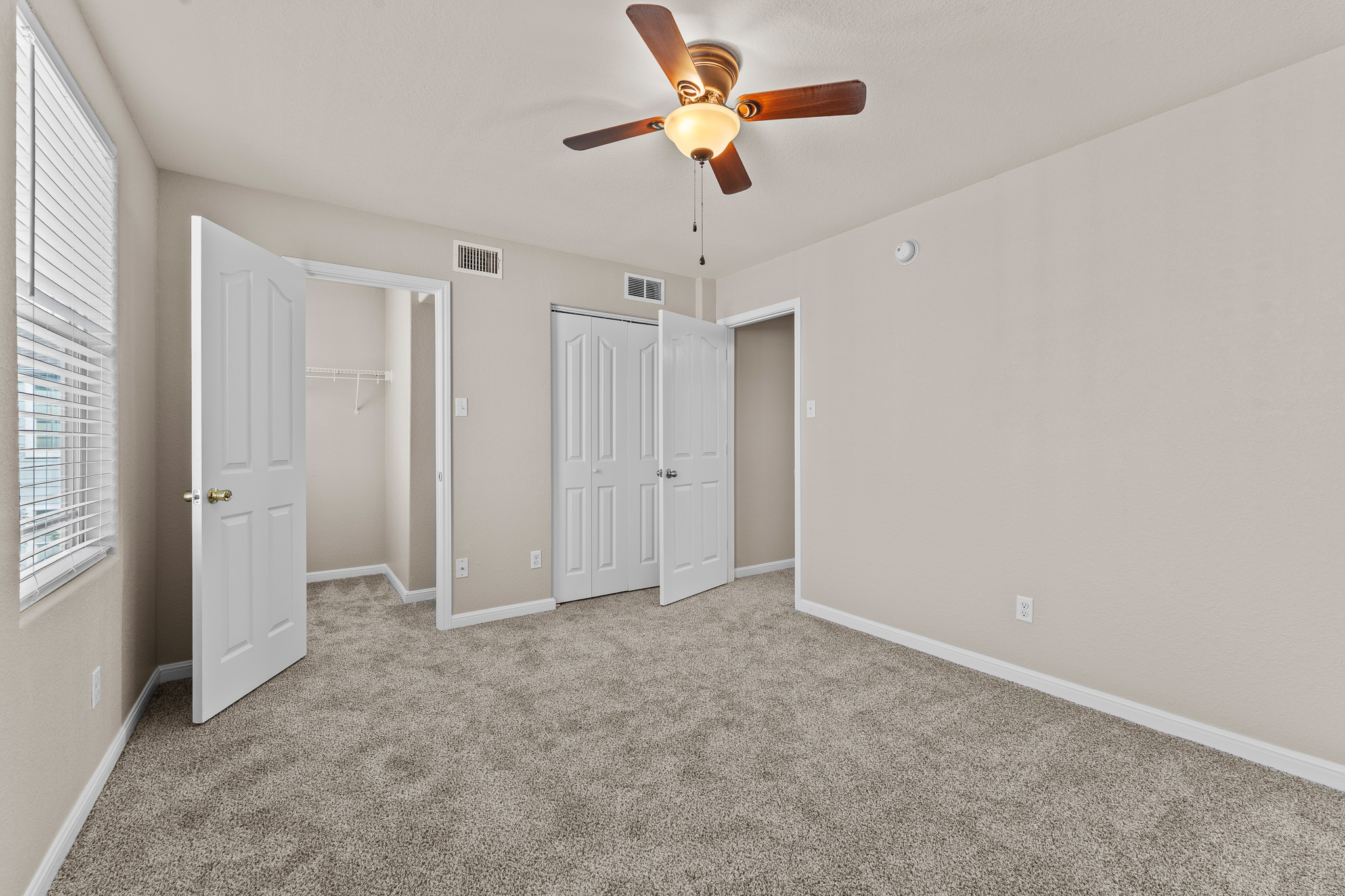220 Trestle Tree San Marcos, TX 78666 - Photo 15 of 28 Unfurnished bedroom featuring carpet flooring and a ceiling fan