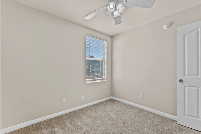 an empty room with a bathroom