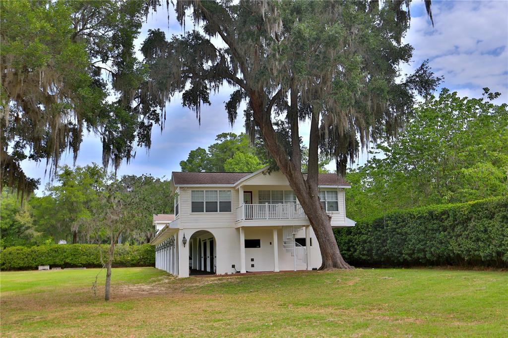 500 Southeast 69th Place Ocala, FL 34480 - Photo 15 of 46 a view of a house with pool and sitting area