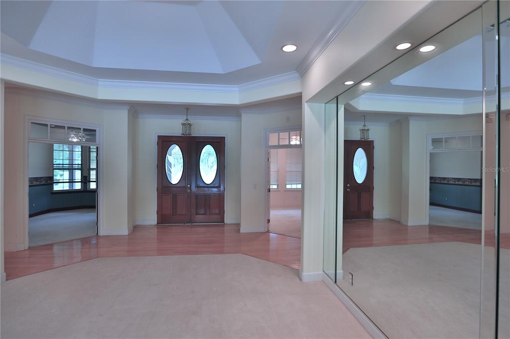 500 Southeast 69th Place Ocala, FL 34480 - Photo 22 of 46 wooden floor and windows in a room