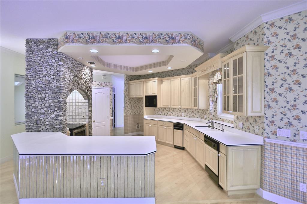 500 Southeast 69th Place Ocala, FL 34480 - Photo 24 of 46 a bathroom with a sink a vanity and mirror