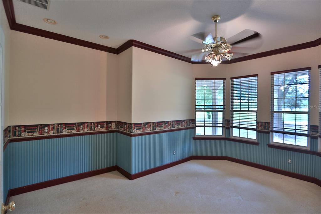 500 Southeast 69th Place Ocala, FL 34480 - Photo 28 of 46 a view of an empty room with a window