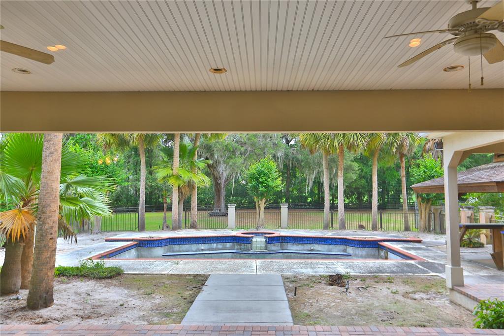 500 Southeast 69th Place Ocala, FL 34480 - Photo 30 of 46 a view of a patio with a garden
