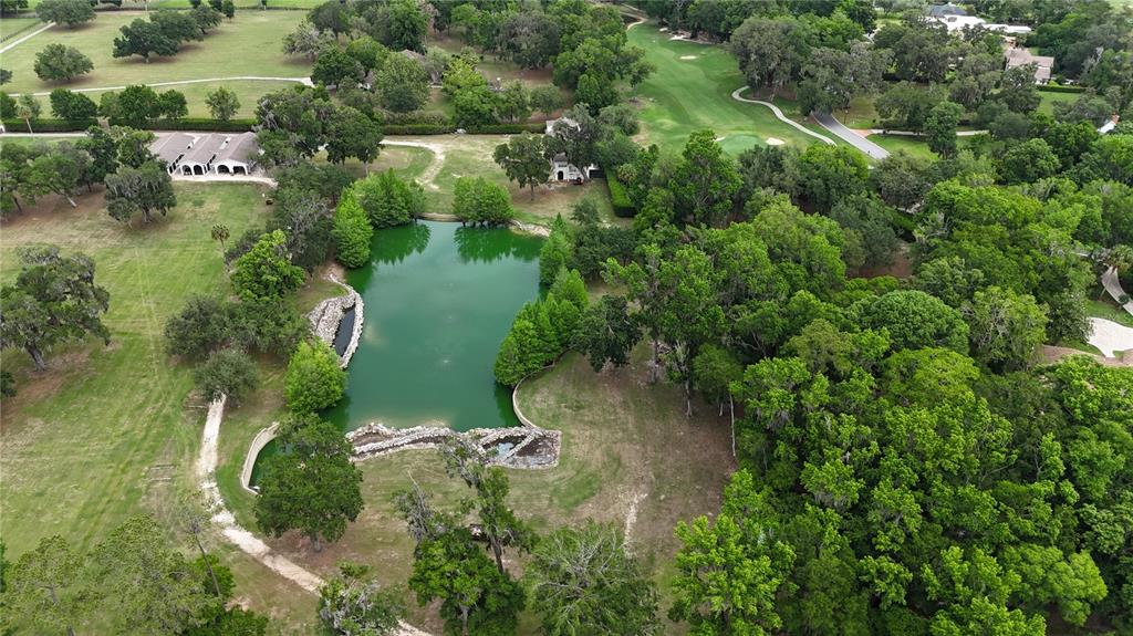 500 Southeast 69th Place Ocala, FL 34480 - Photo 41 of 46 an aerial view of residential house with outdoor space and trees all around