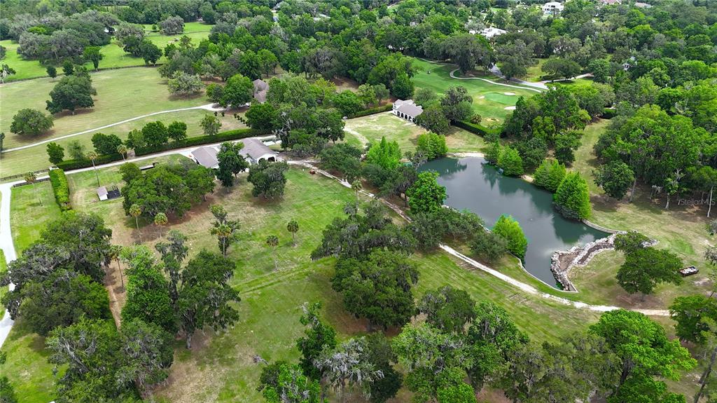 500 Southeast 69th Place Ocala, FL 34480 - Photo 46 of 46 an aerial view of residential houses with outdoor space and trees all around