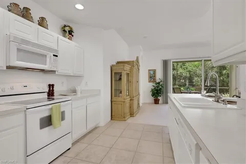 $399,000 | 890 Eastham Way, Unit Q102, Naples, FL 34104