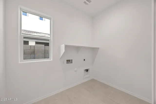 an empty room with a empty space and window