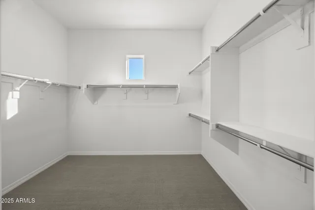 a view of a hallway with windows