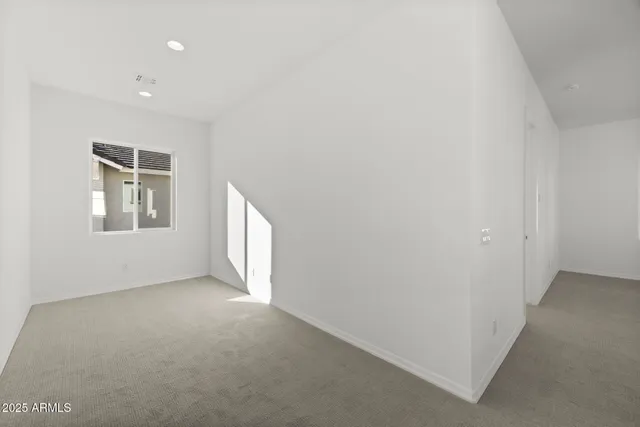 a view of a hallway with a window