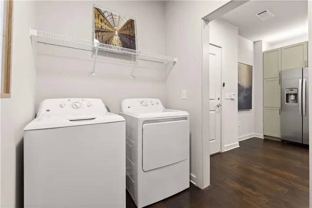a utility room with dryer and washer