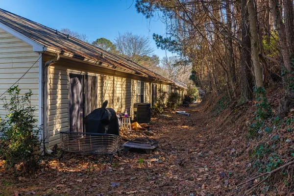 a view of a back yard of the house