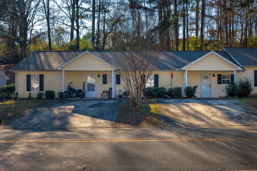 172 Jacobs Way Jasper, GA 30143 - Photo 2 of 13 a view of a house with swimming pool and sitting area