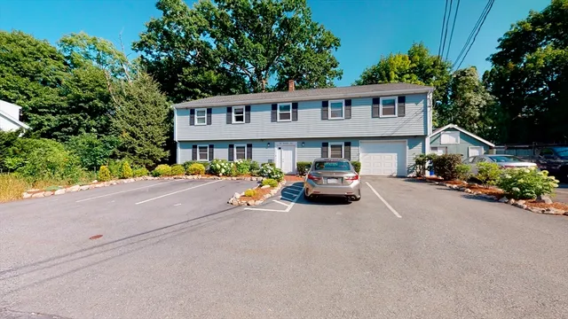a view of a street with cars on road