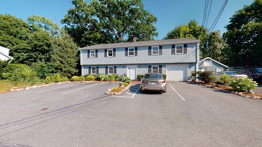 10 Riverbank Road, Unit 2 Maynard, MA 01754 - Photo 13 of 13 a view of a street with cars on road
