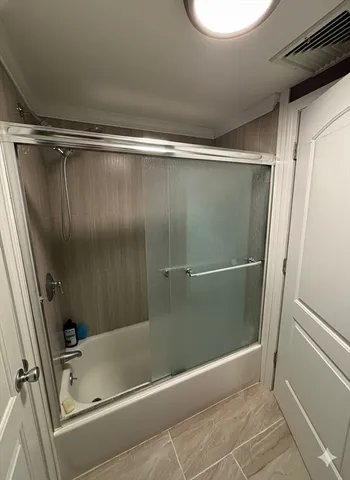 a bathroom with a bathtub