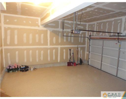 57 Timber Ridge Road North Brunswick, NJ 08902 - Photo 22 of 25 a view of a room with racks on the wall