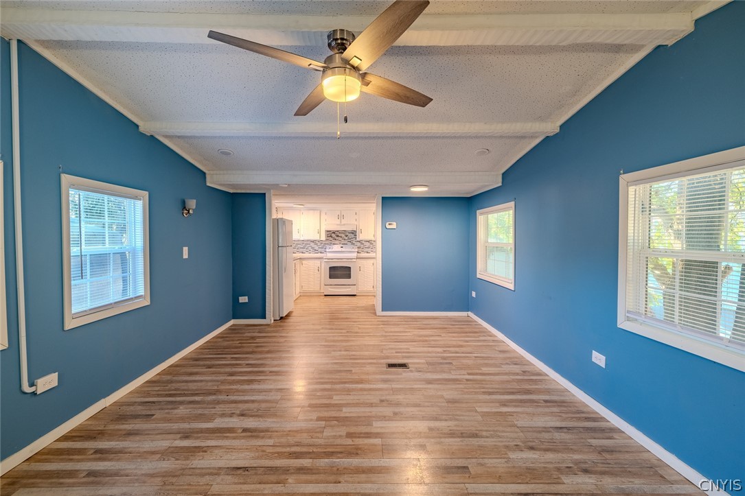 6940 Highbridge Road, Unit 6 De Witt, NY 13066 - Photo 2 of 16 Livingroom/Kitchen