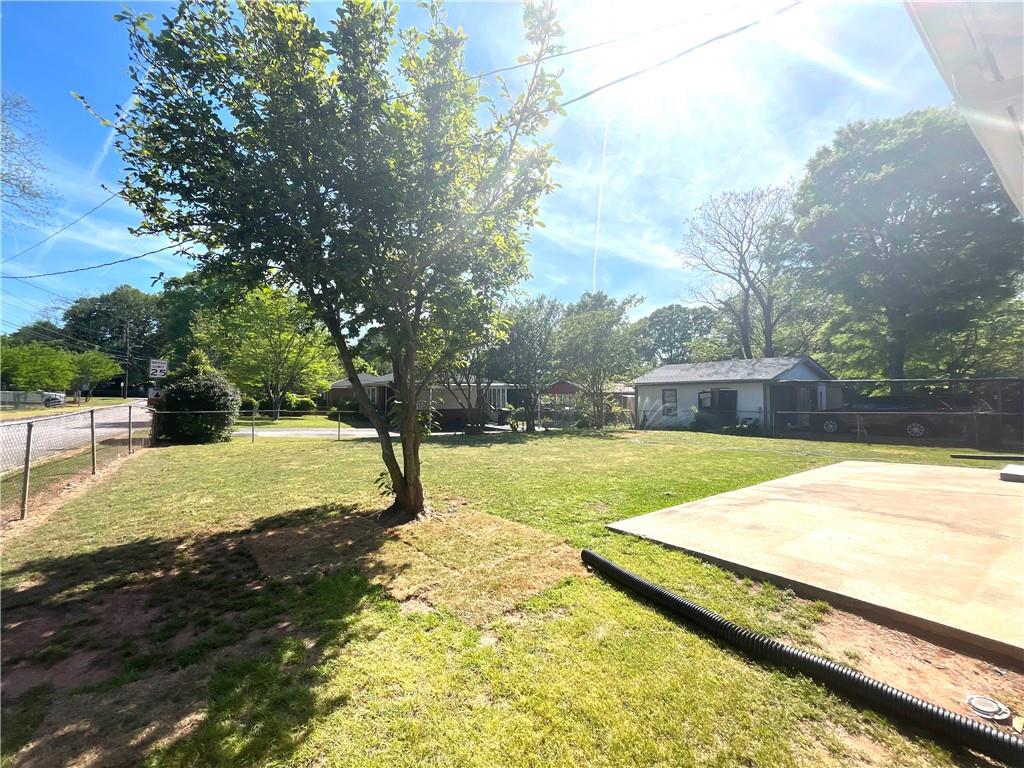 119 Fifth Avenue Jonesboro, GA 30236 - Photo 25 of 29 a view of yard with swimming pool