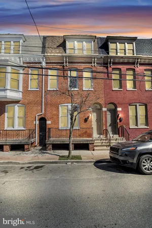 a car parked in front of a building