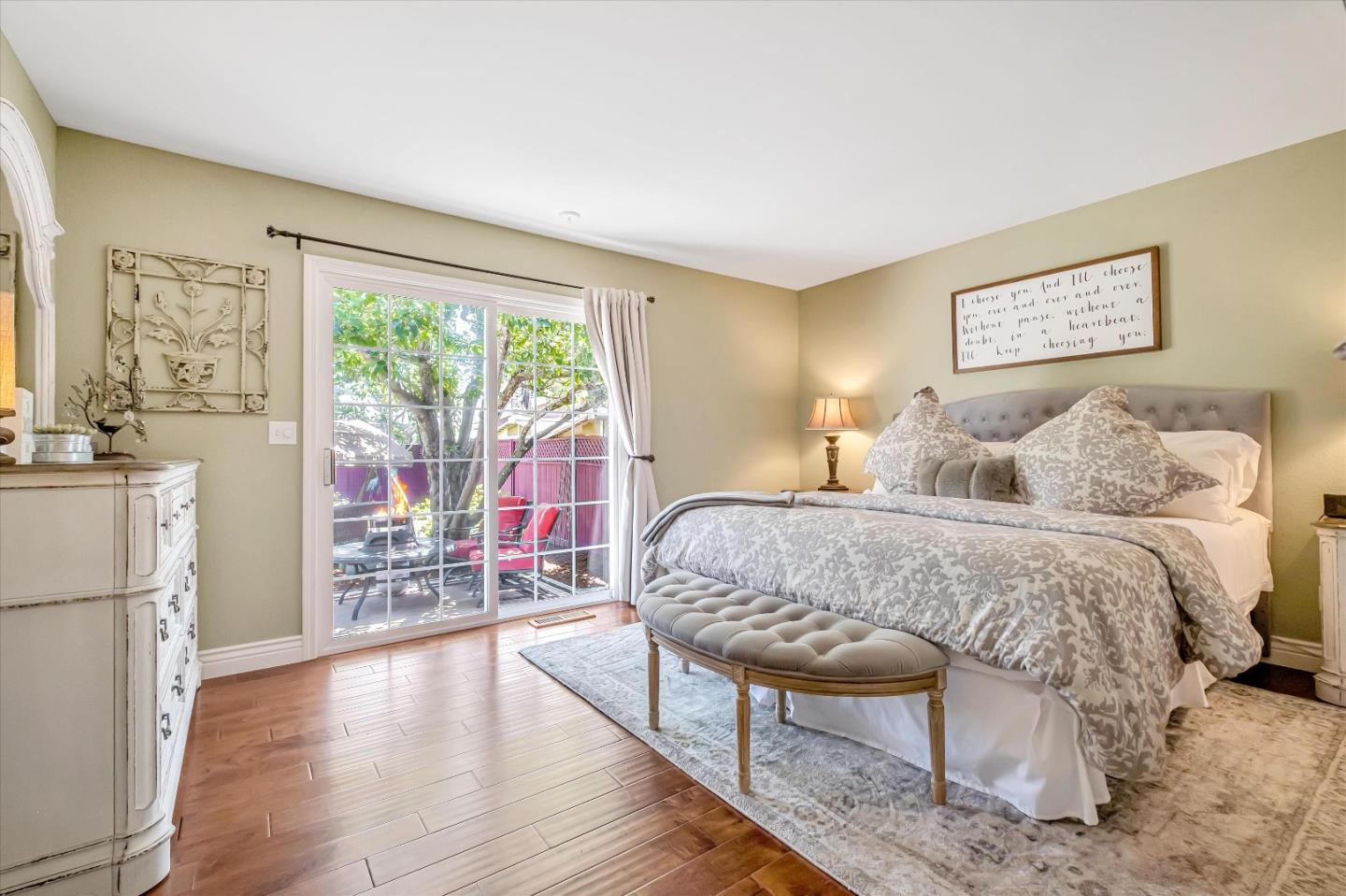 10 Linden Road Watsonville, CA 95076 - Photo 16 of 38 a bedroom with a bed and wooden floor