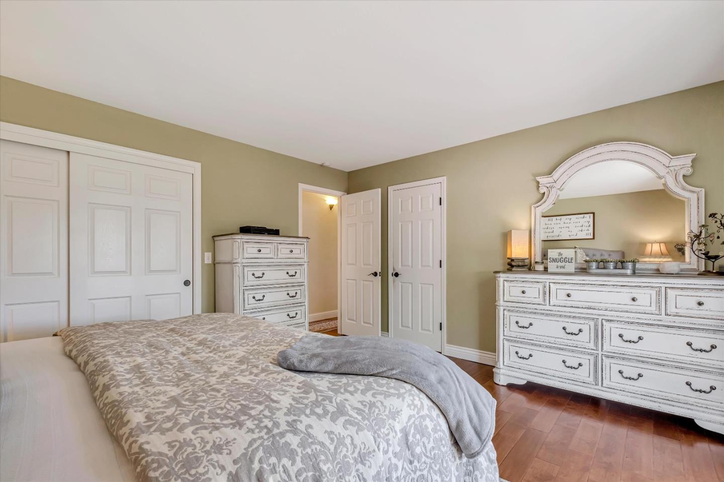 10 Linden Road Watsonville, CA 95076 - Photo 17 of 38 a bedroom with a bed and a dresser