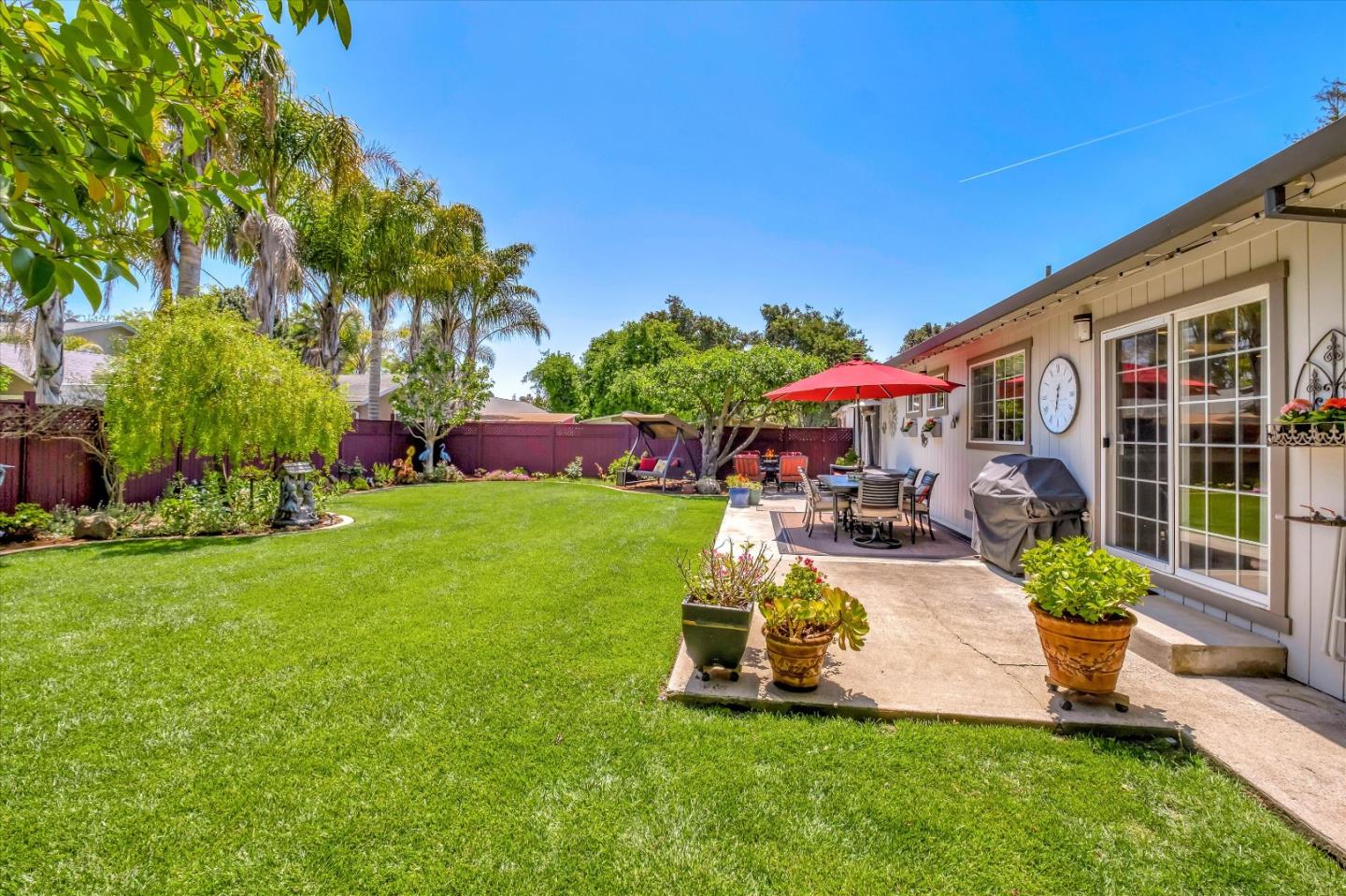 10 Linden Road Watsonville, CA 95076 - Photo 28 of 38 a view of a chair and table in backyard of the house