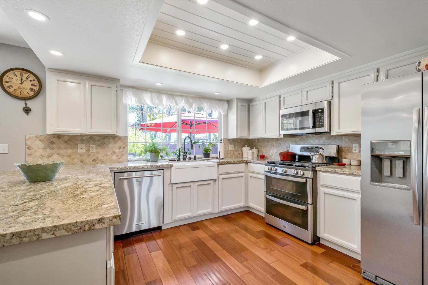10 Linden Road Watsonville, CA 95076 - Photo 9 of 38 a kitchen with granite countertop a sink stainless steel appliances and cabinets
