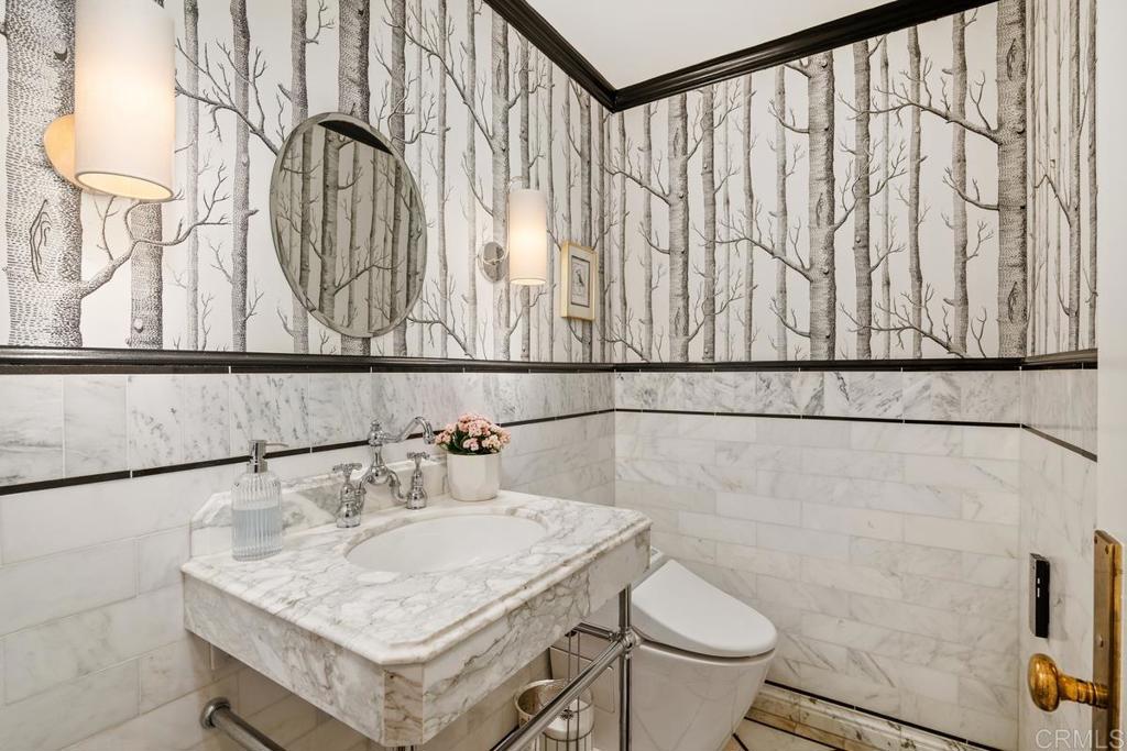 2539 Lone Jack Road Encinitas, CA 92024 - Photo 11 of 37 a bathroom with a sink and a toilet