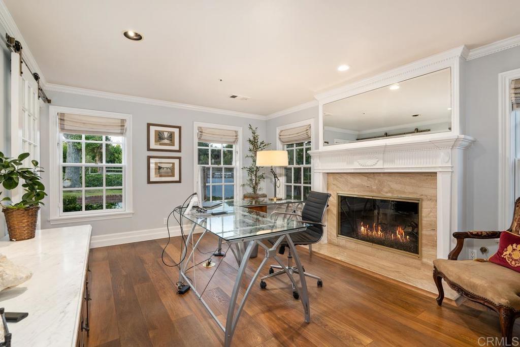 2539 Lone Jack Road Encinitas, CA 92024 - Photo 14 of 37 a living room with furniture and a fireplace