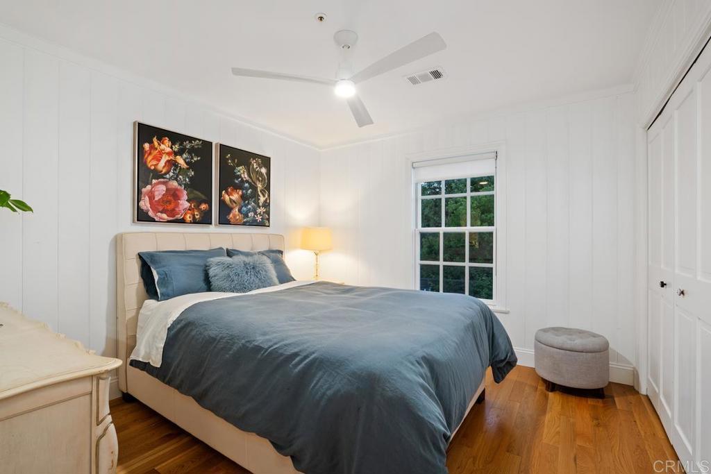 2539 Lone Jack Road Encinitas, CA 92024 - Photo 26 of 37 a bed sitting in a bedroom next to a window