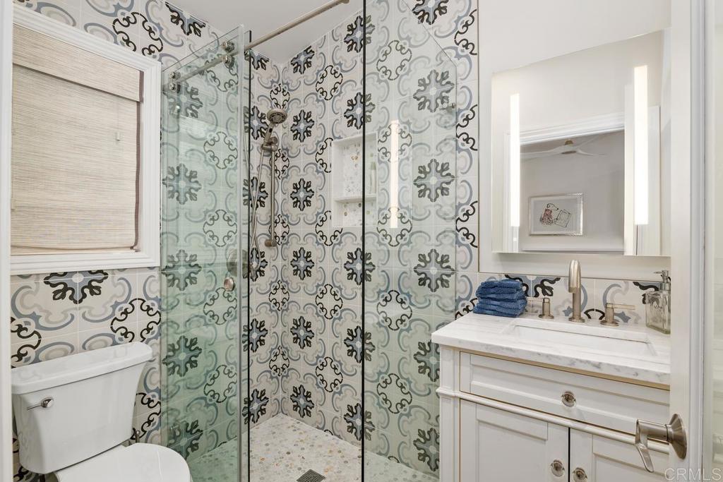 2539 Lone Jack Road Encinitas, CA 92024 - Photo 31 of 37 a bathroom with a sink toilet and shower