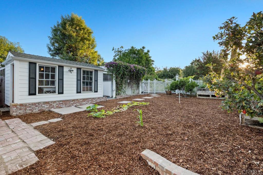 2539 Lone Jack Road Encinitas, CA 92024 - Photo 33 of 37 a backyard of a house with lots of green space