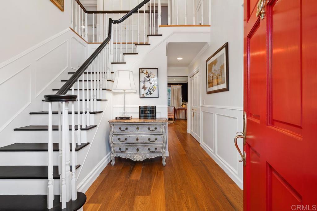 2539 Lone Jack Road Encinitas, CA 92024 - Photo 5 of 37 a view of front door with wooden floor and stairs