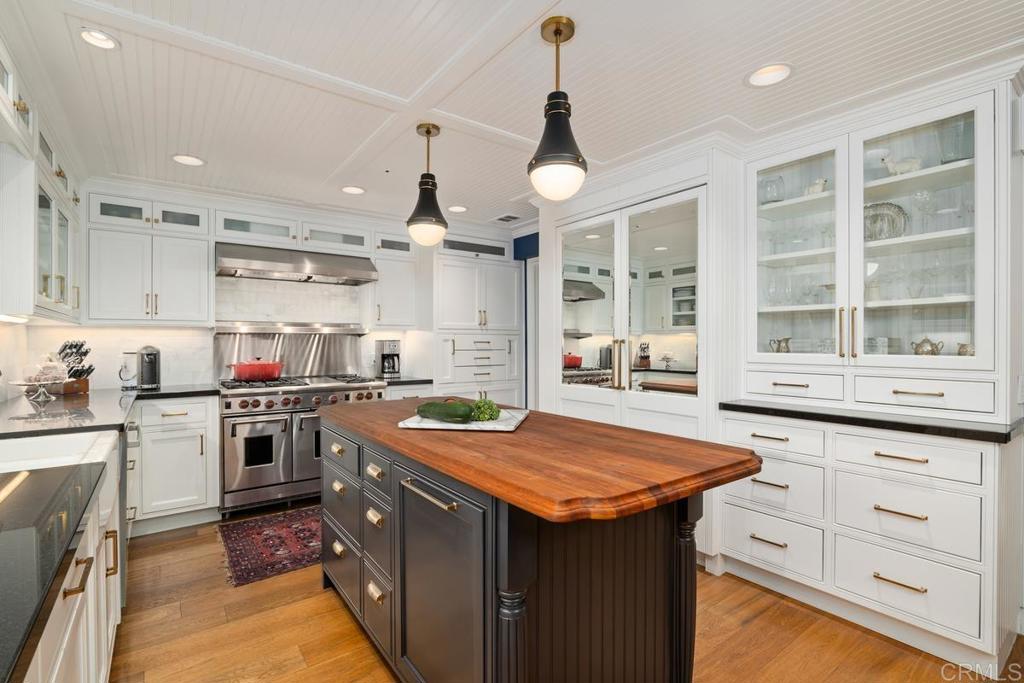 2539 Lone Jack Road Encinitas, CA 92024 - Photo 6 of 37 a kitchen with stainless steel appliances granite countertop a stove and a sink
