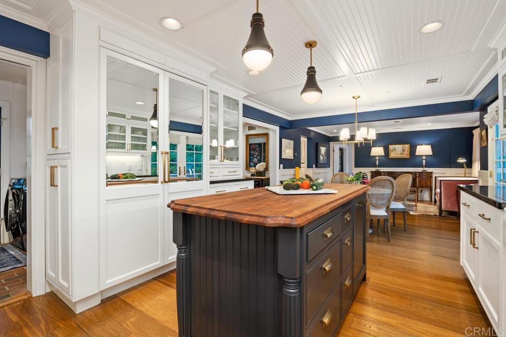 2539 Lone Jack Road Encinitas, CA 92024 - Photo 8 of 37 a kitchen with stainless steel appliances granite countertop a sink and a refrigerator