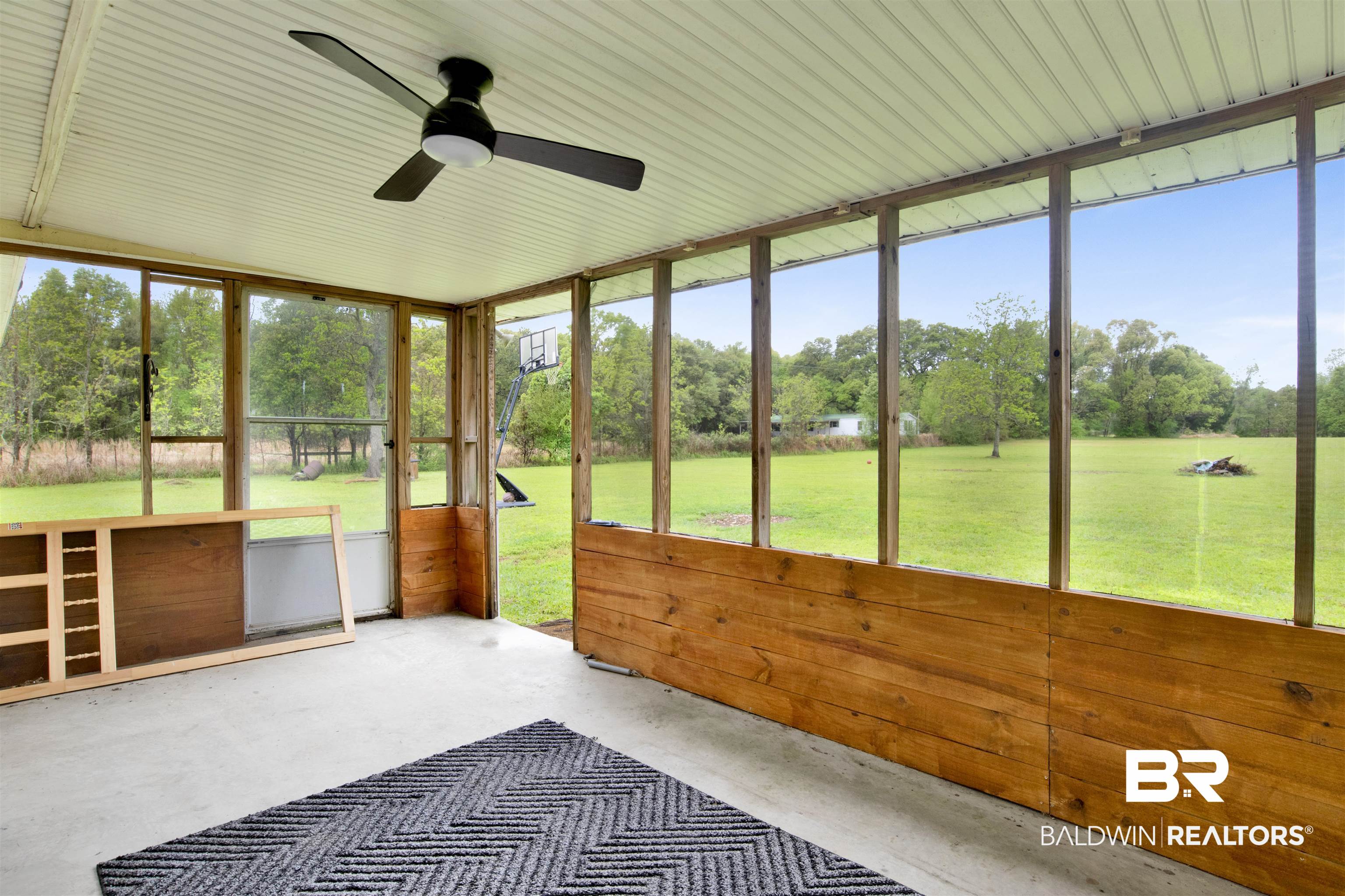 10244 Magnolia Road Irvington, AL 36544 - Photo 9 of 37 Unfurnished sunroom featuring ceiling fan