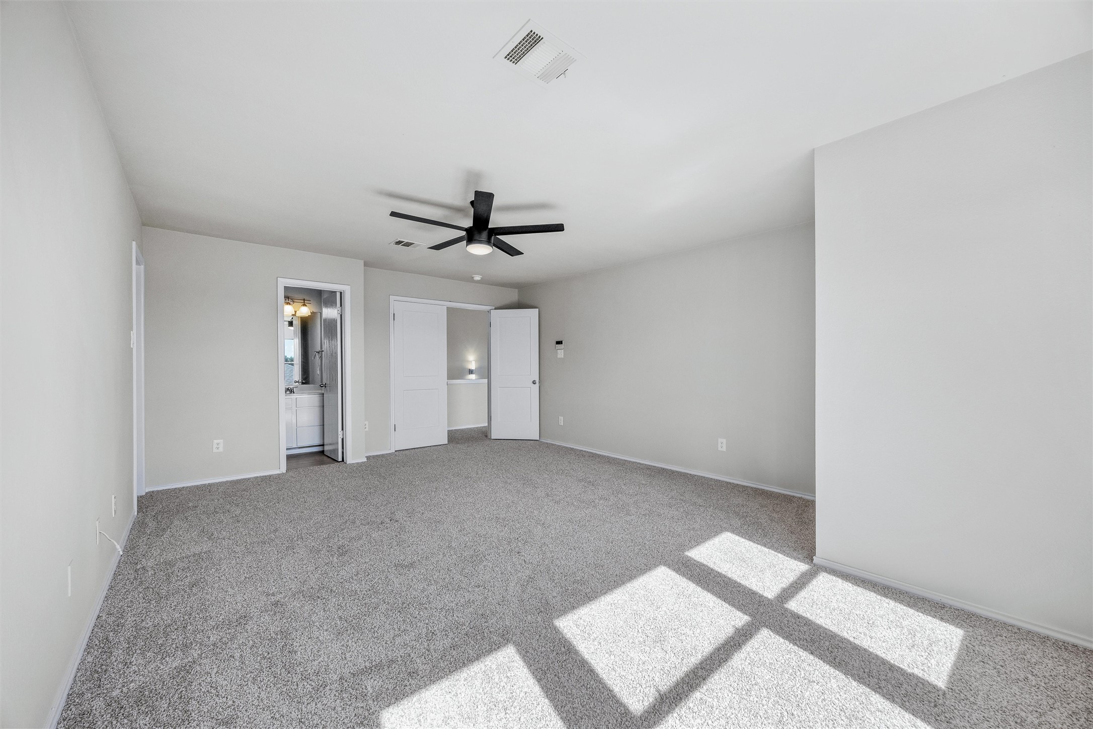 7541 Redrick Drive Austin, TX 78747 - Photo 29 of 40 Unfurnished bedroom featuring visible vents, carpet flooring, and baseboards