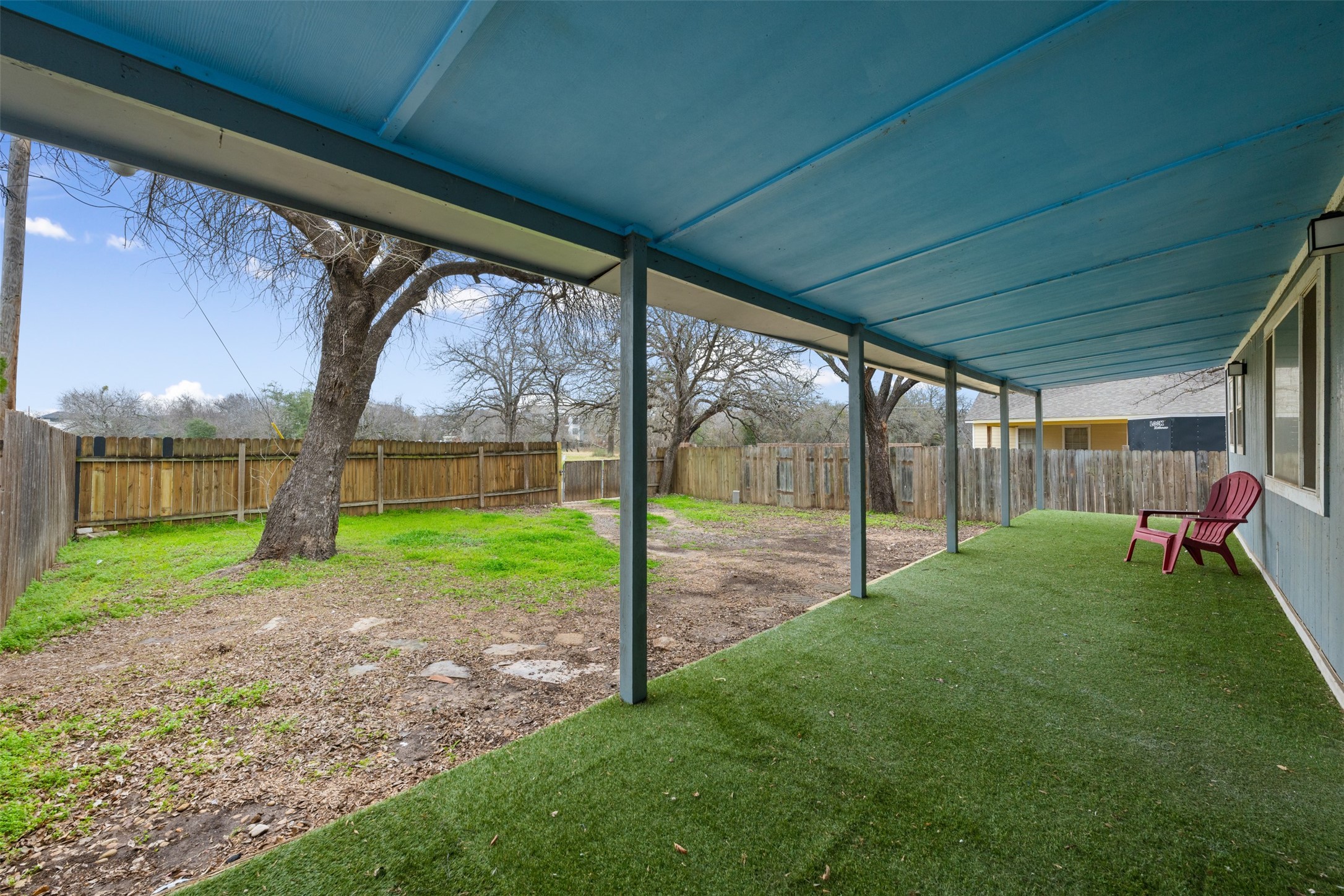901 Valdez Street, Unit 13 Austin, TX 78741 - Photo 13 of 38 a view of a house with backyard from a porch