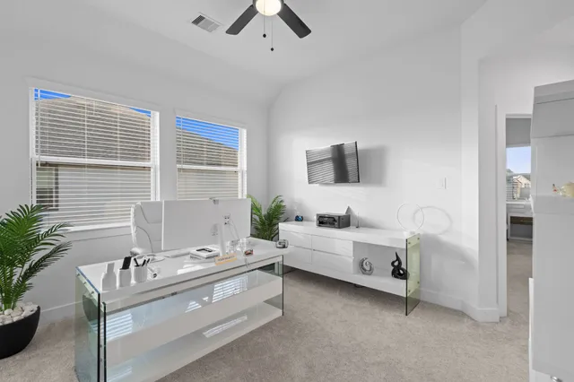 a living room with furniture and window