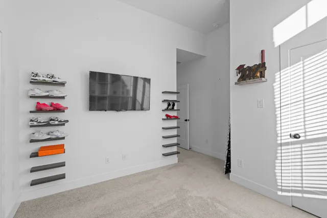 a view of a livingroom with furniture