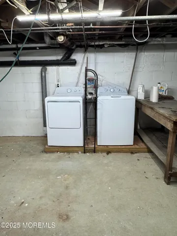 a utility room with a washer and dryer
