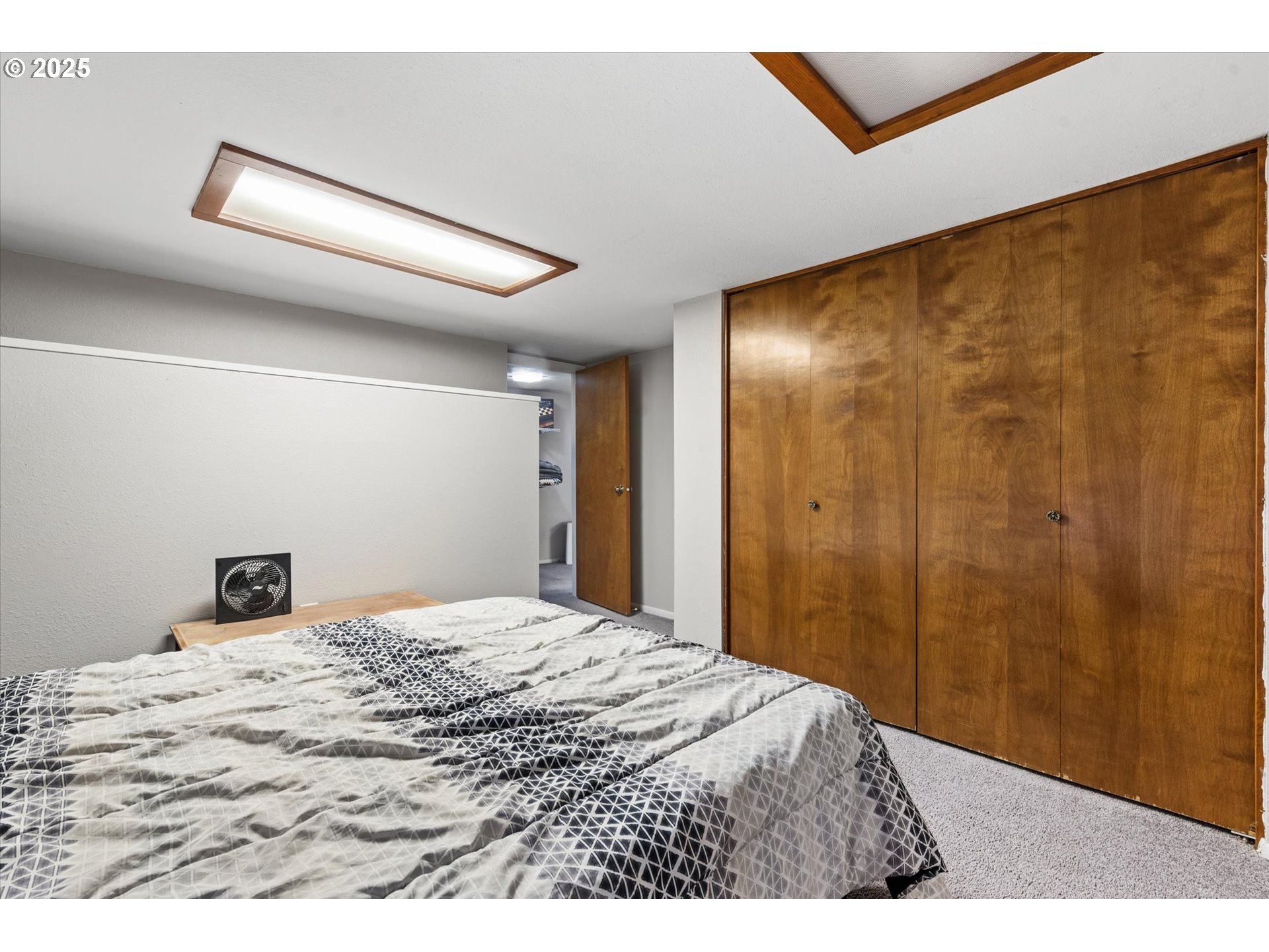 1805 East Street Baker City, OR 97814 - Photo 20 of 45 a bedroom with a bed and a mirror