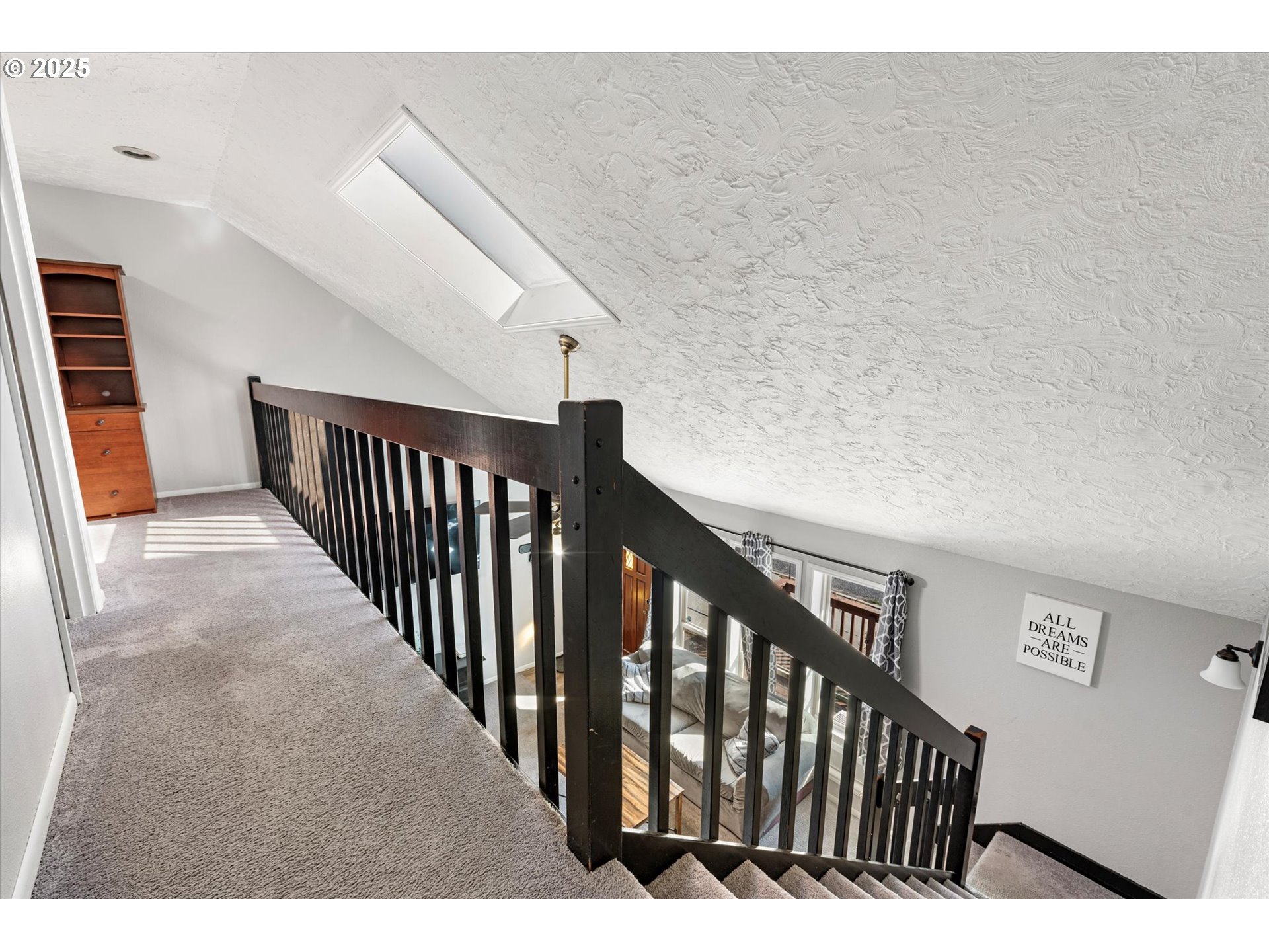 1805 East Street Baker City, OR 97814 - Photo 25 of 45 a view of staircase with railing and white walls