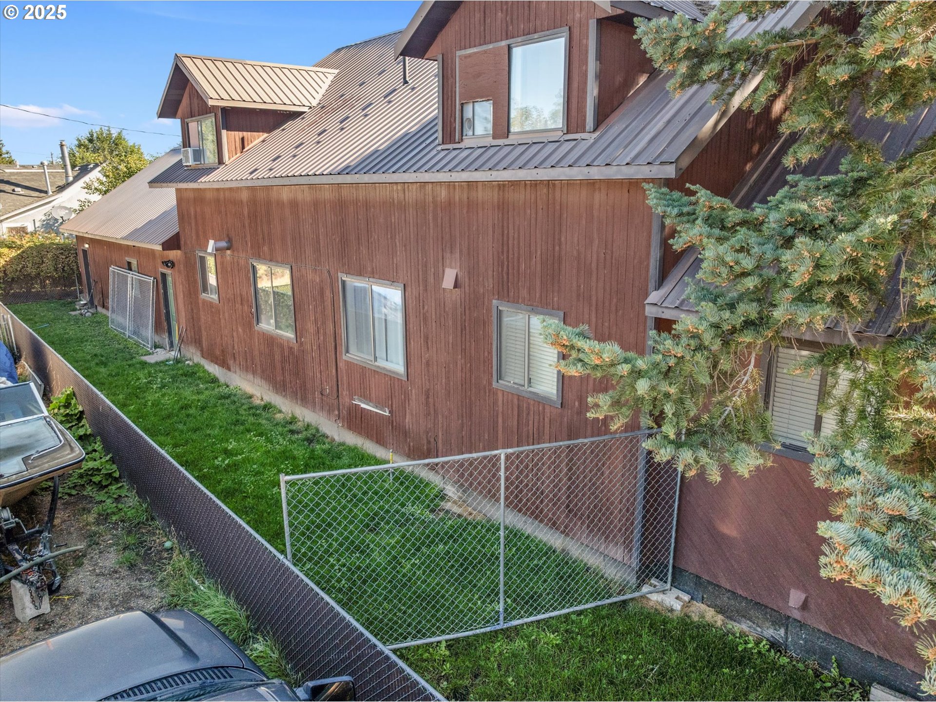 1805 East Street Baker City, OR 97814 - Photo 3 of 45 a view of a house with a yard and plants